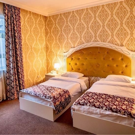 Room photo Reikartz Modarixon Bukhara